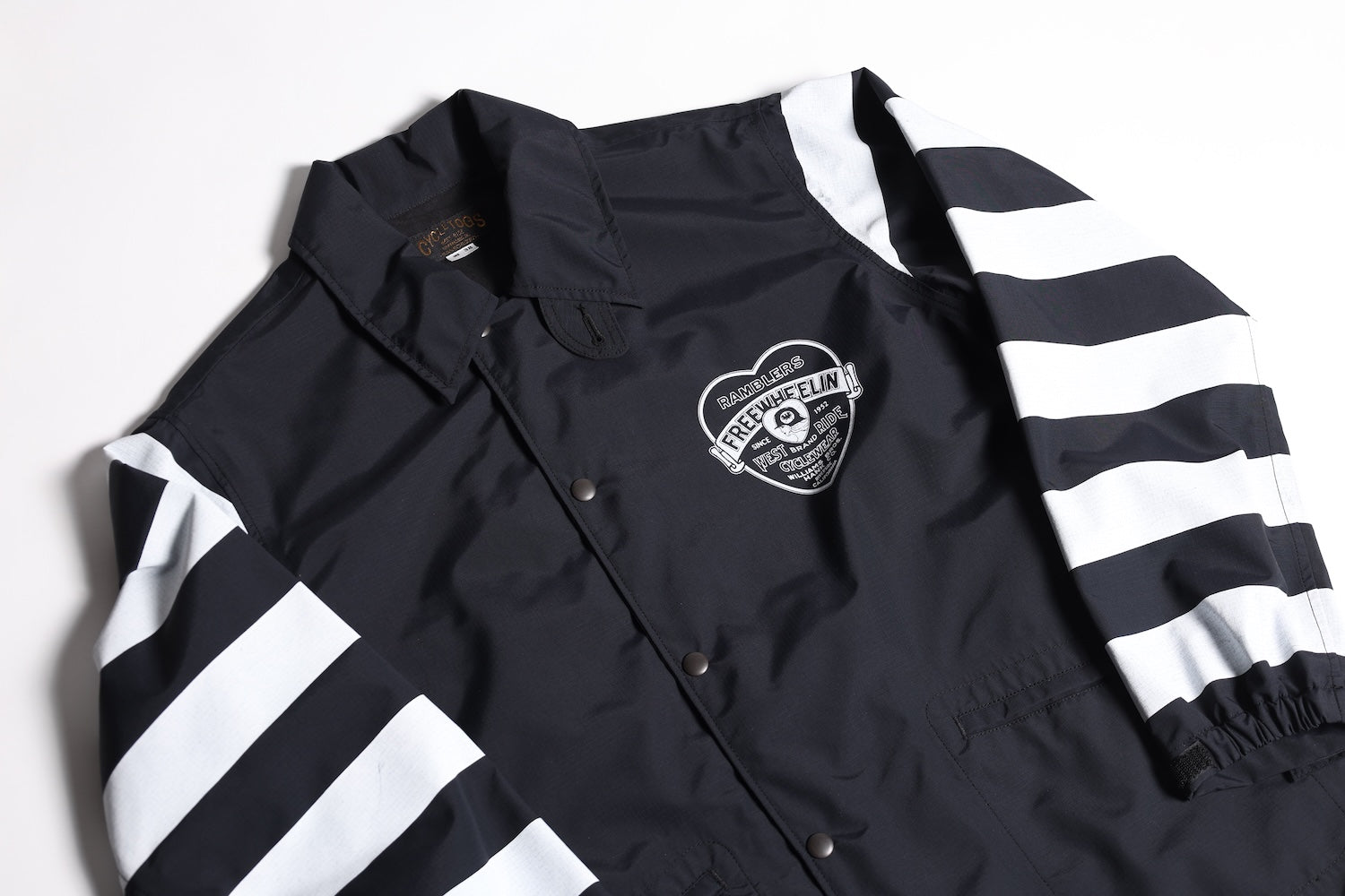 SUPPLEX CYCLE WINDBREAKER BORDER SLEEVE BLACK